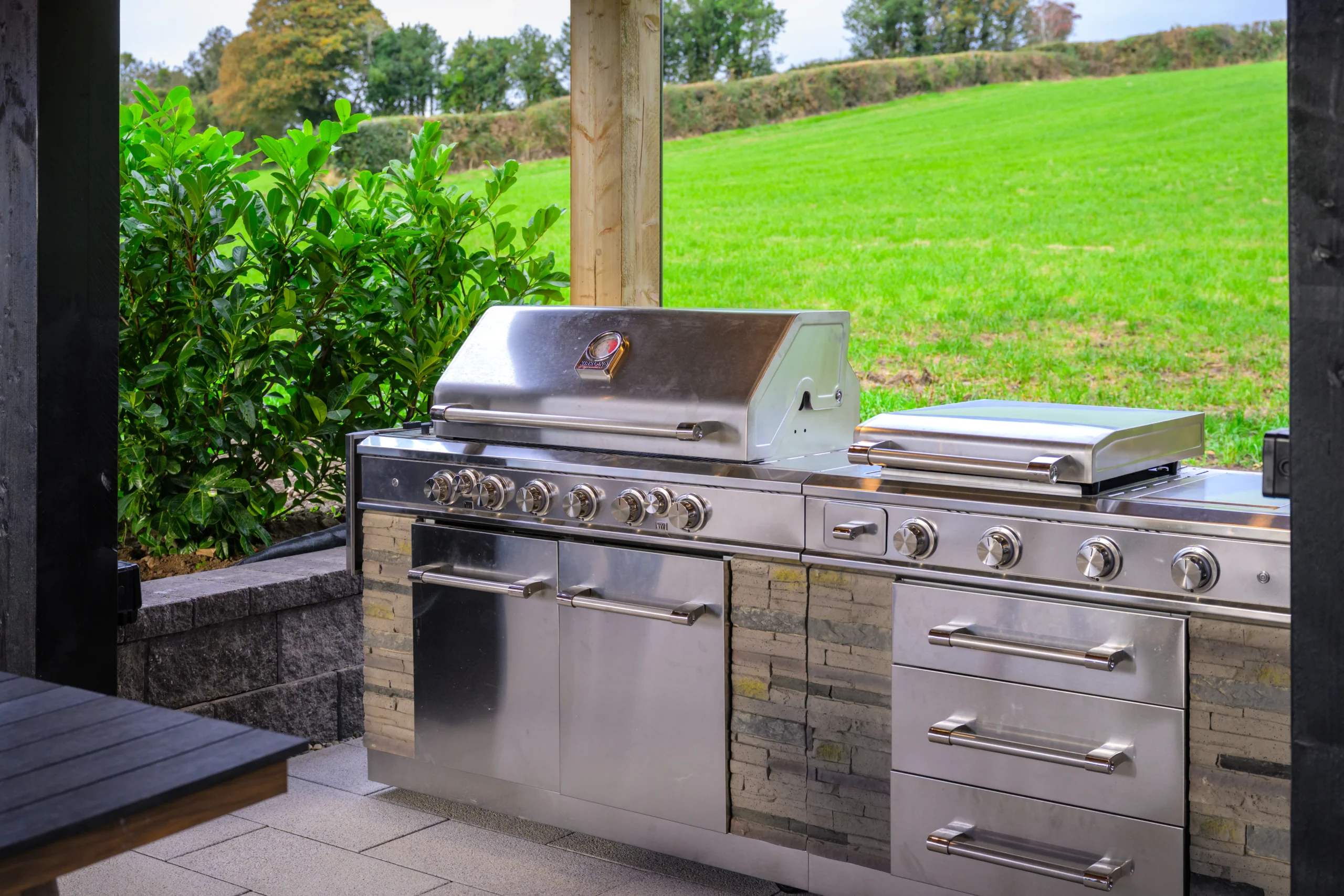 Closeup of Rosie's Grill area outside overlooking a field