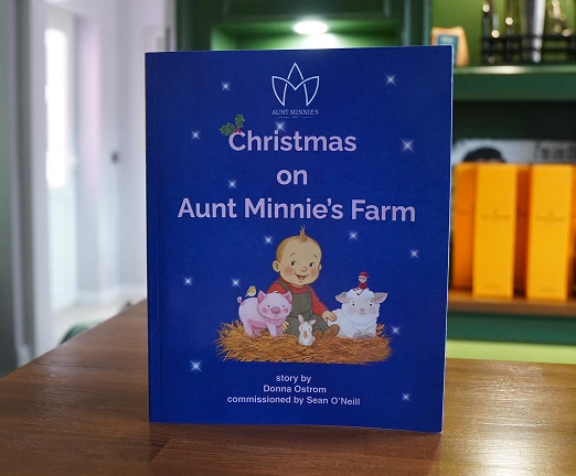An image of the childrens book Christmas on Aunt Minnie's Farm written by Donna Ostrom