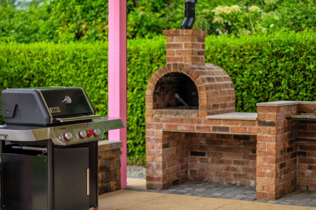An image showcasing the grill and pizza oven at Lily's Pink House