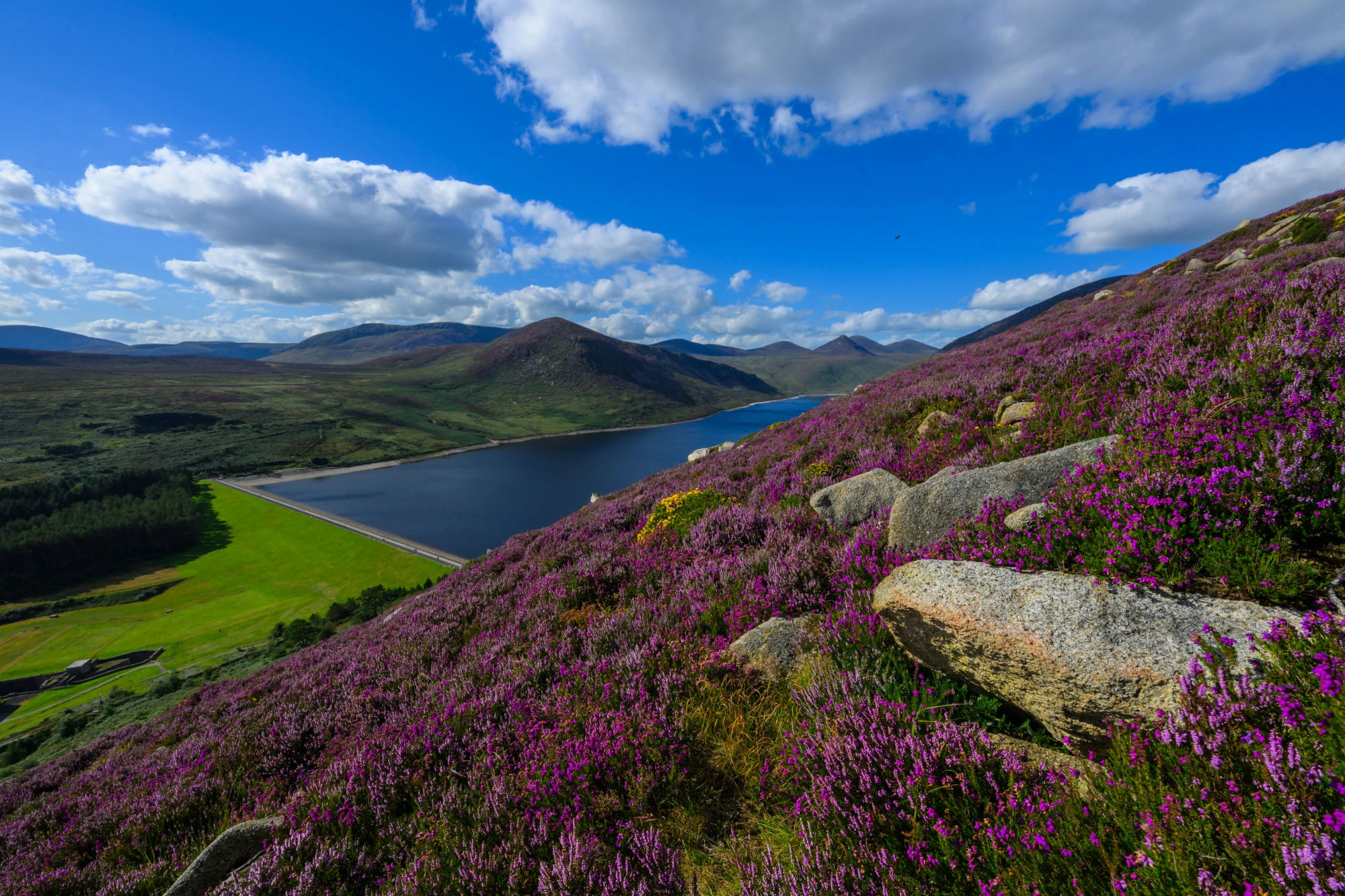 An image taken from the Wee Binnian mountain side showcasing the Silent Valley Reservoir
